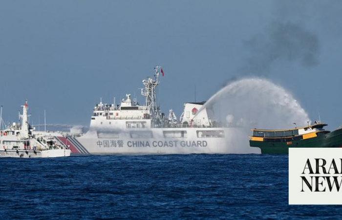 China says it saw armed Philippine personnel on vessel in disputed South China Sea