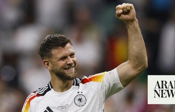 Last-gasp Fuellkrug goal rescues top spot for Euro hosts Germany