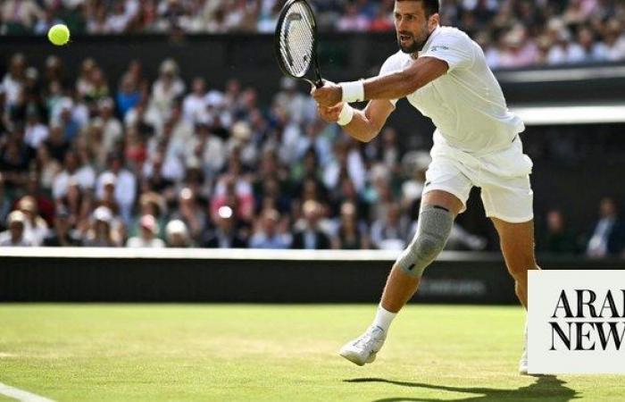 Djokovic into Wimbledon third round after rookie scare