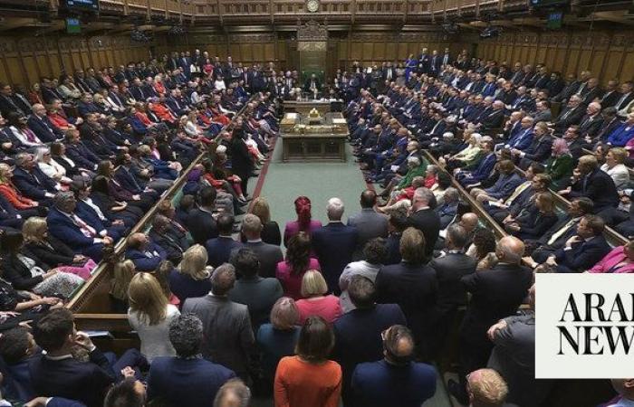 Labour ministers in government seats as UK parliament returns