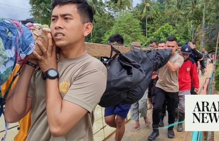 The search intensifies for dozens buried in an Indonesian landslide that killed at least 23 people