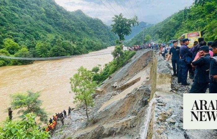 Nepal recovers first body from buses swept away by landslide