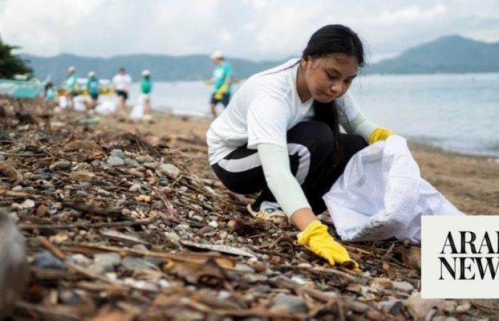 Philippine diving town trades plastic for rice to tackle ocean waste