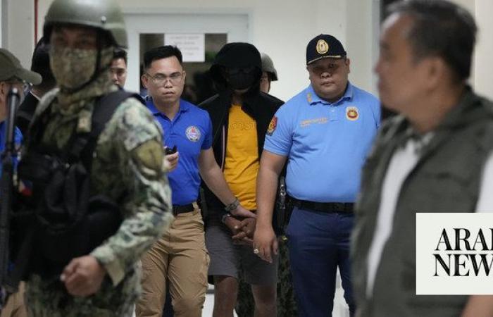 Philippine officials say suspect in the killings of 2 Australians and a Filipino has surrendered
