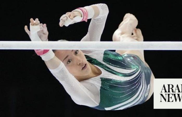 Nemour impresses with her bars routine at Olympics after switching to the Algerian team