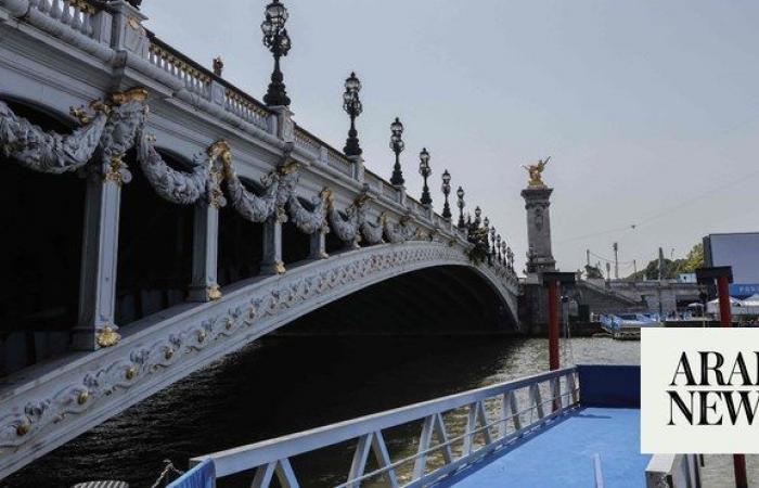 Olympic triathletes will swim in Paris’ Seine River after days of concerns about water quality