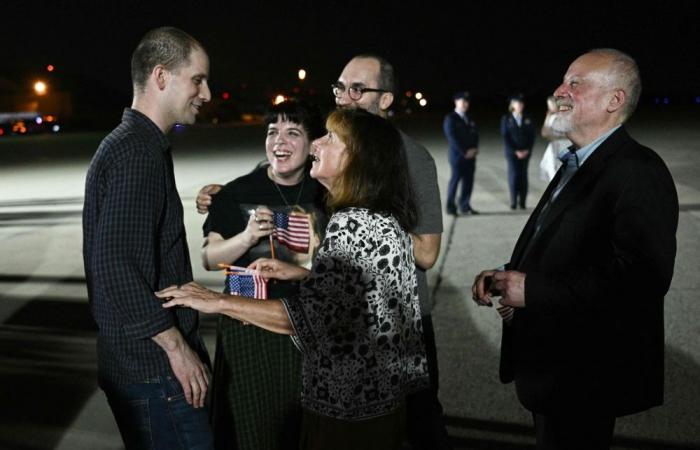 Big smiles, even bigger hugs: Biden and Harris welcome freed Americans in historic prisoner swap with Russia