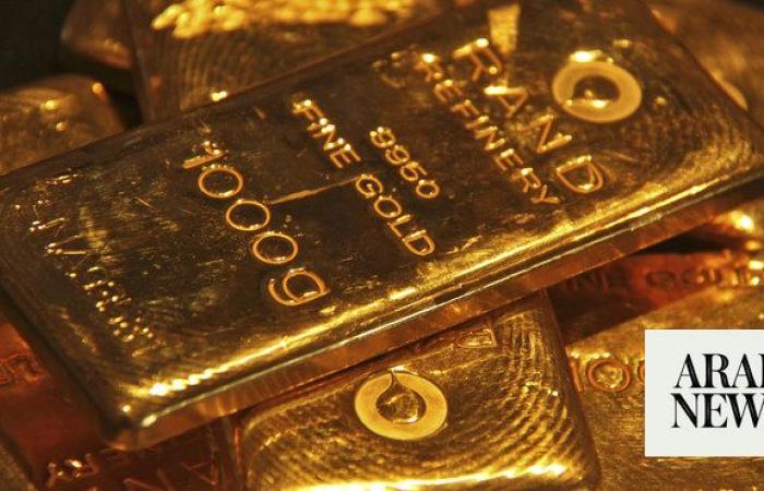 Gold slides over 2% as wider market rout spills over