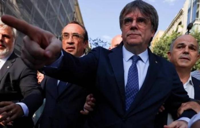 Police hunt ex-Catalan separatist leader after shock return from exile