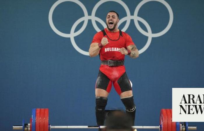 Bulgaria weightlifter wins gold 15 months since a hotel sink fell and severed an Achilles tendon