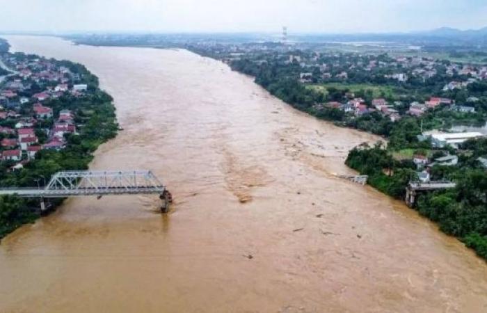 Cars plunge into river as super typhoon destroys Vietnam bridge