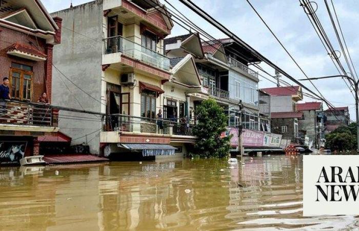 Flash flood sweeps away hamlet as Vietnam storm toll rises to 141 dead