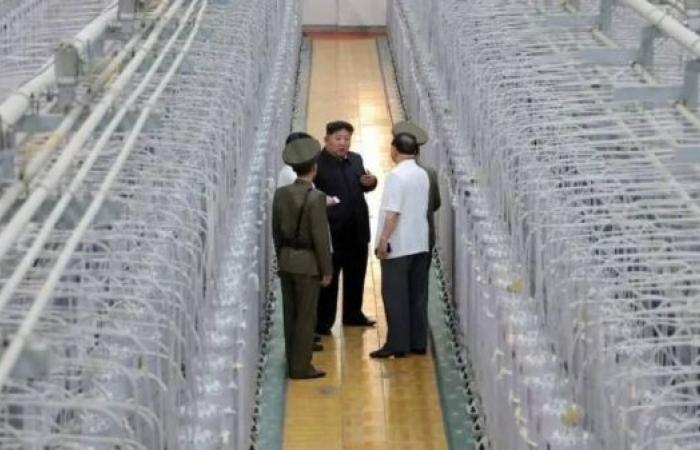 N Korea releases rare photos of Kim at uranium facility