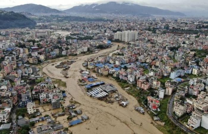 Flooding in Nepal kills at least 32, leaves 12 missing