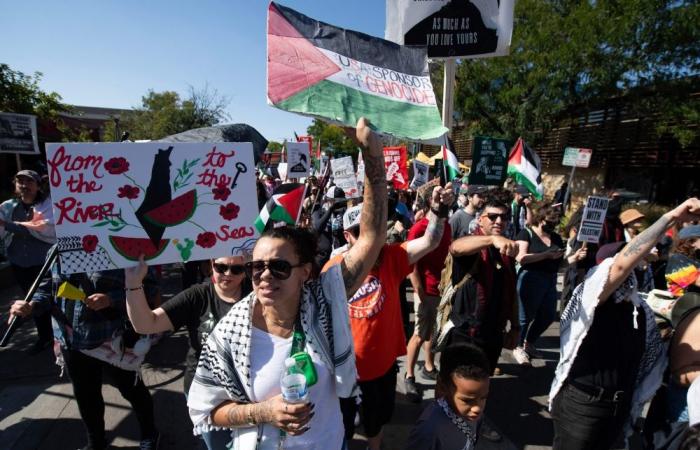 ‘Ethnic cleansing’: man sets arm on fire as thousands march across US marking Gaza war anniversary, calling for ceasefire