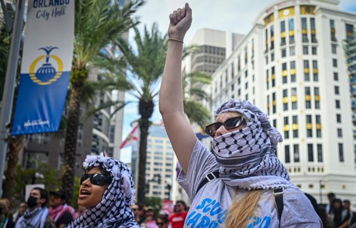 ‘Ethnic cleansing’: man sets arm on fire as thousands march across US marking Gaza war anniversary, calling for ceasefire