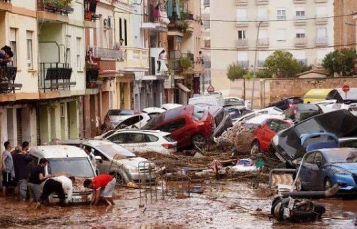 Flash floods in Spain leave at least 95 dead, disrupt rail and road services