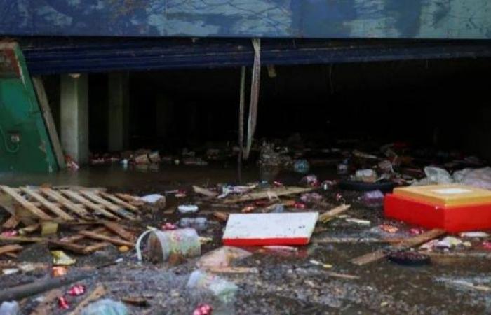 Spanish flood rescuers focus search on underground car parks