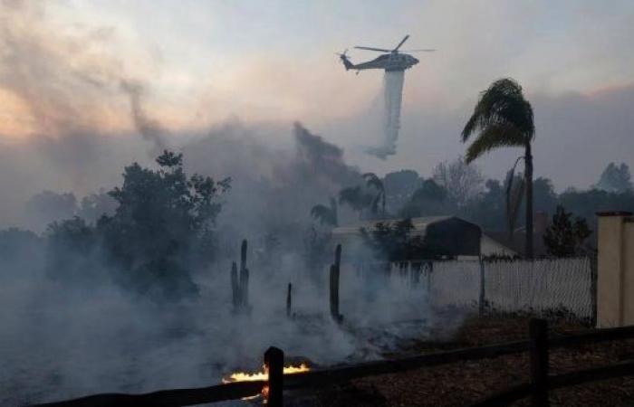 Californians desperately flee their homes amid raging wildfires