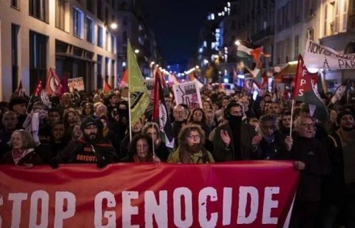 Thousands of protesters march in Paris ahead of tense football match between France and Israel 