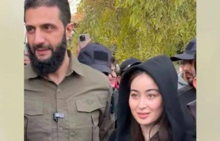 Syria rebel leader dismisses controversy over photo with woman