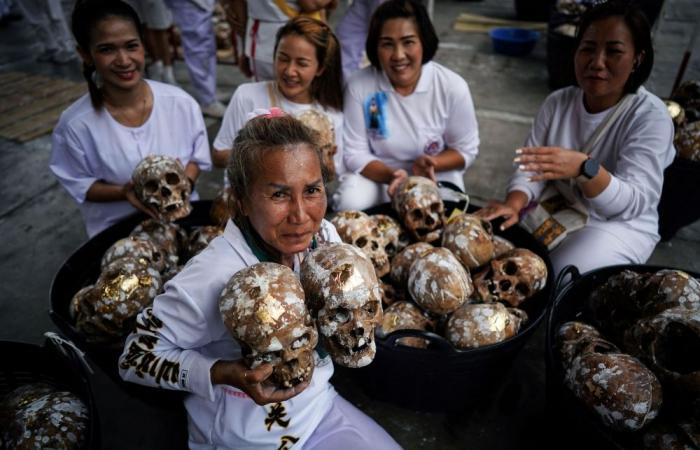 Thai ceremony for the dead brings good karma and emotional closure