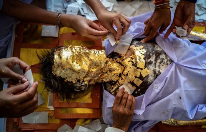 Thai ceremony for the dead brings good karma and emotional closure