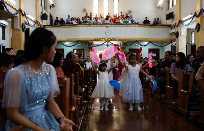 Silent night in Aceh as Indonesian Catholics hold modest Christmas mass amid Shariah law restrictions