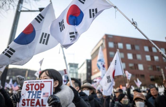 South Korea’s impeached President Yoon Suk Yeol resists arrest over martial law bid