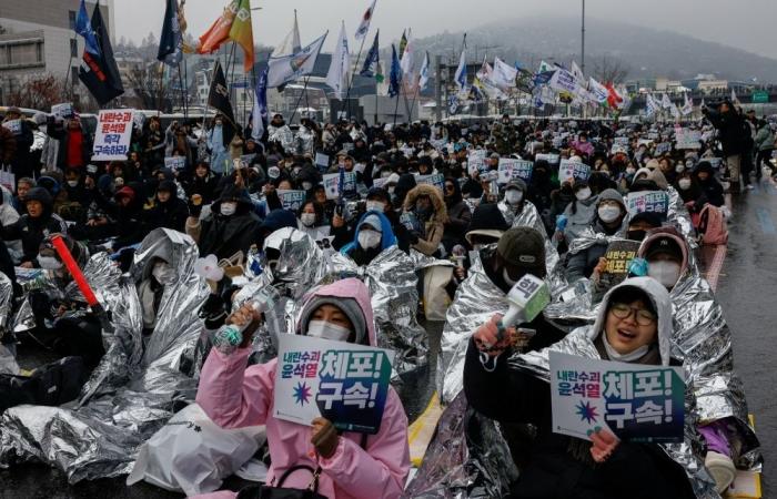 Thousands rally in snowstorm as South Korea’s Yoon faces arrest deadline