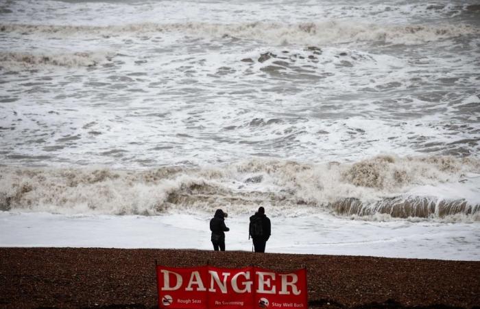 Amber weather warning: Heavy snow and freezing rain ground flights across England, power outages affect thousands