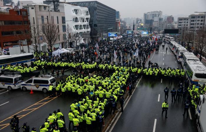 Thousands rally in snowstorm as South Korea’s Yoon faces arrest deadline