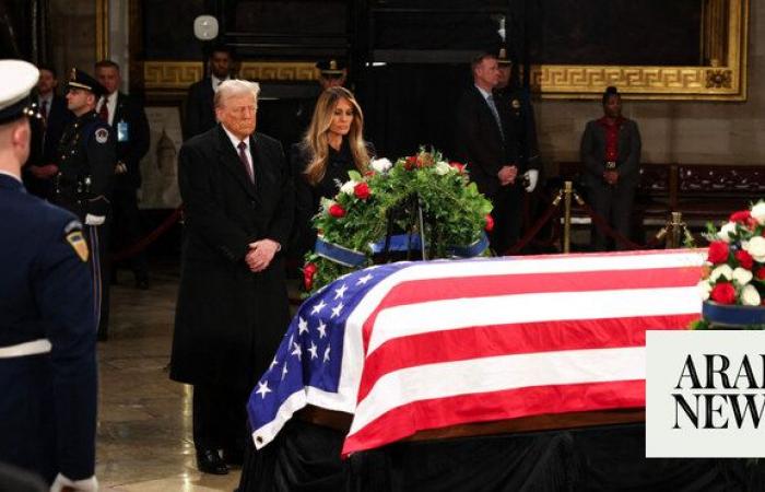 President-elect Donald Trump visits Jimmy Carter’s casket in Capitol Rotunda after criticizing him