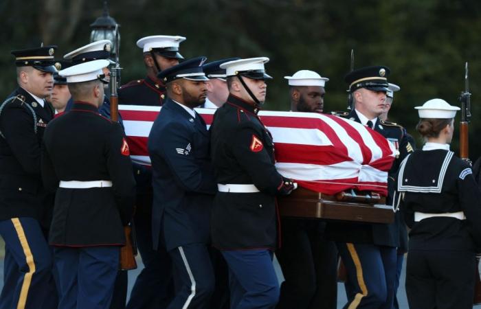 Jimmy Carter briefly unites US as presidents attend funeral