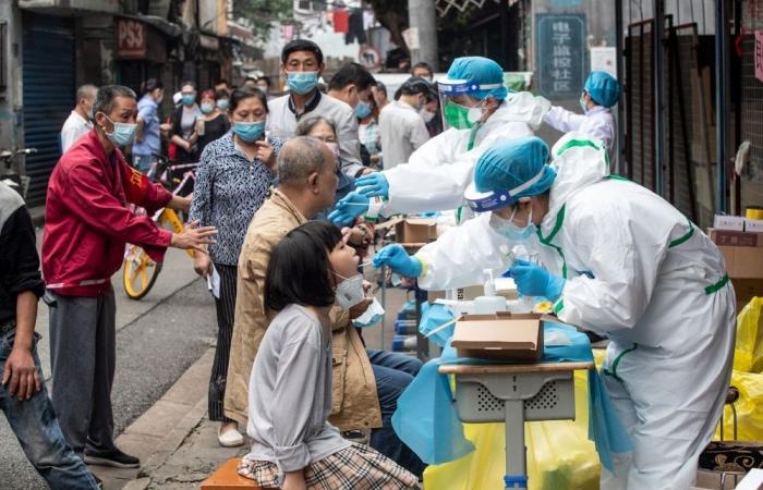 China marks muted fifth anniversary of first Covid death