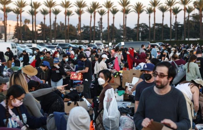 Firefighters race to beat LA blazes as winds grow and death toll hits 16