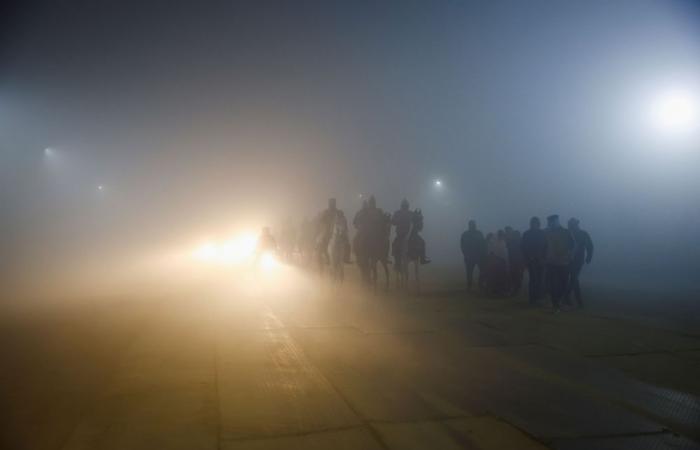 Train and flight delays hit northern India as dense fog blankets Delhi