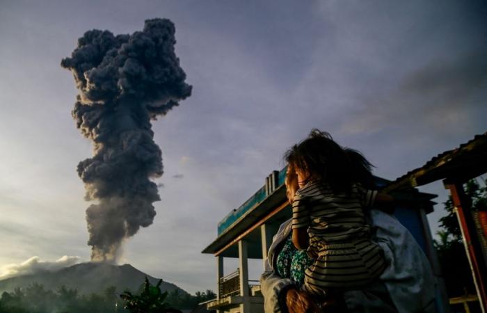 Mount Ibu erupts in eastern Indonesia, forcing mass evacuation of villagers