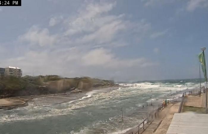 Severe storms cut power for thousands of Australians, trigger flood warnings across New South Wales