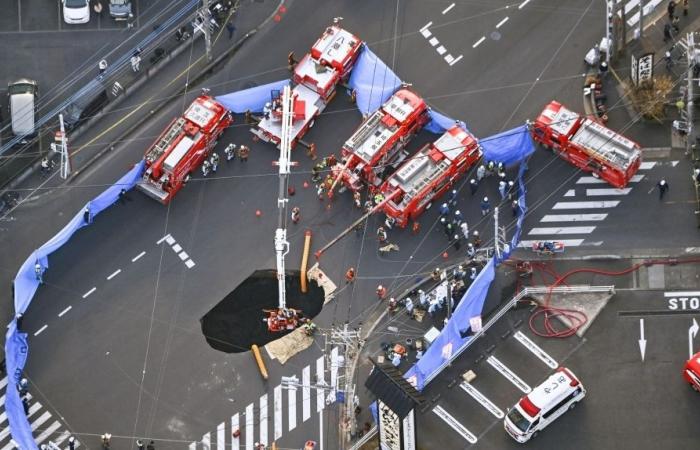 Truck cabin found two weeks after Tokyo sinkhole swallows vehicle, but sewage water delays search for driver