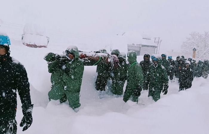 Rescuers search for 22 workers buried under snow, debris after avalanche in remote border area of India