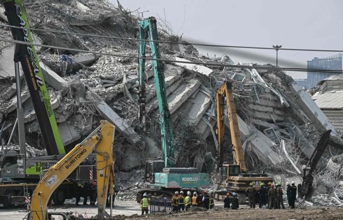 Thai construction tycoon and 14 others surrender to police over fatal Bangkok tower collapse