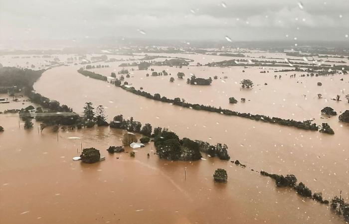 Torrential rain triggers flash floods as Australia’s worst in years leave communities cut off, 50,000 warned to evacuate