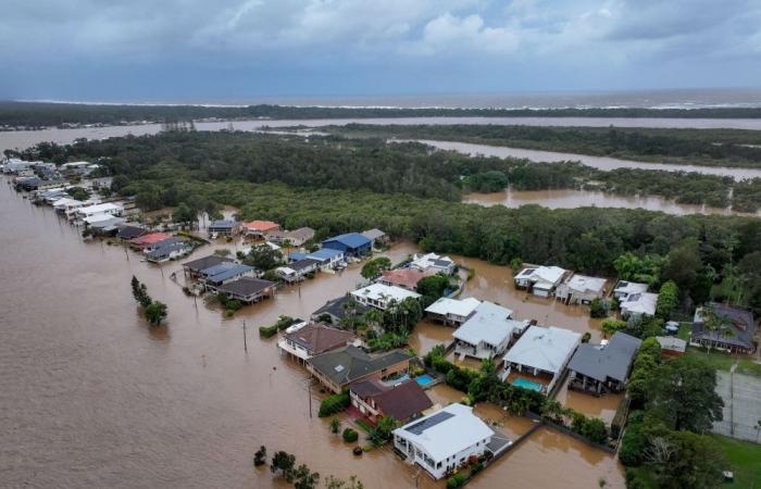 Torrential rain triggers flash floods as Australia’s worst in years leave communities cut off, 50,000 warned to evacuate