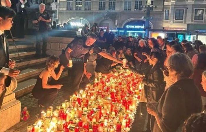 Austrians hold minute of silence and vigil for 10 victims of school shooting