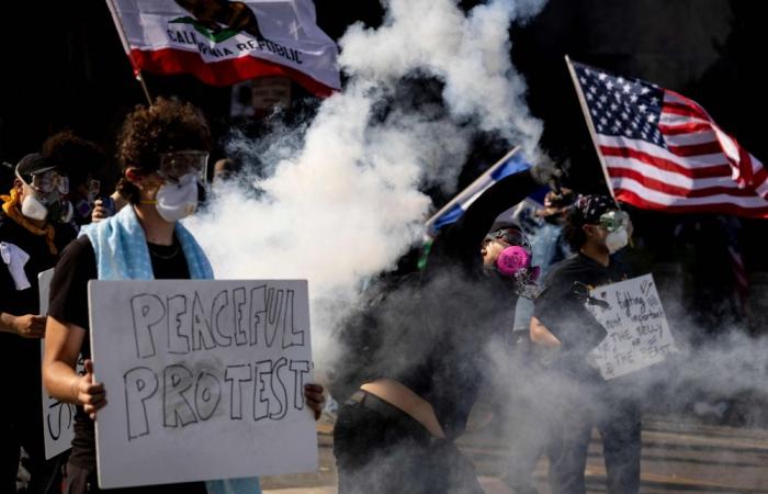 Balloons, bubbles, tear gas: LA’s ‘No Kings’ anti-Trump rallies spiral into chaos as police clash with protesters
