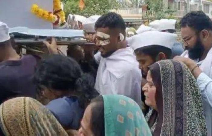 Lone Air India survivor carries coffin of brother killed in crash