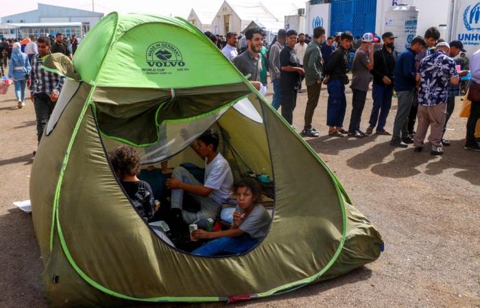 ‘Even begging at home is better’: Afghans flood border as Iran expulsion deadline hits