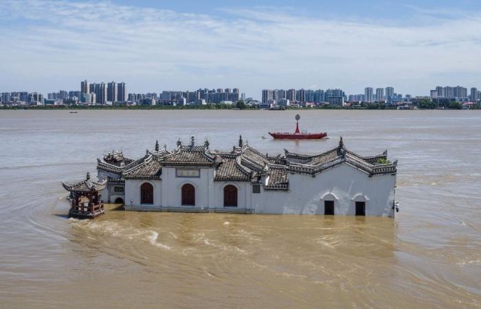 Rivers in southwest China breach flood warning levels, thousands evacuate
