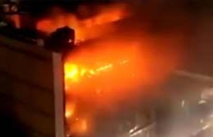 At least 60 killed in Iraqi mall fire as families search for missing loved ones
